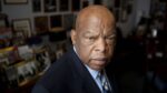 John Lewis picture - 3/4 face in a home office.