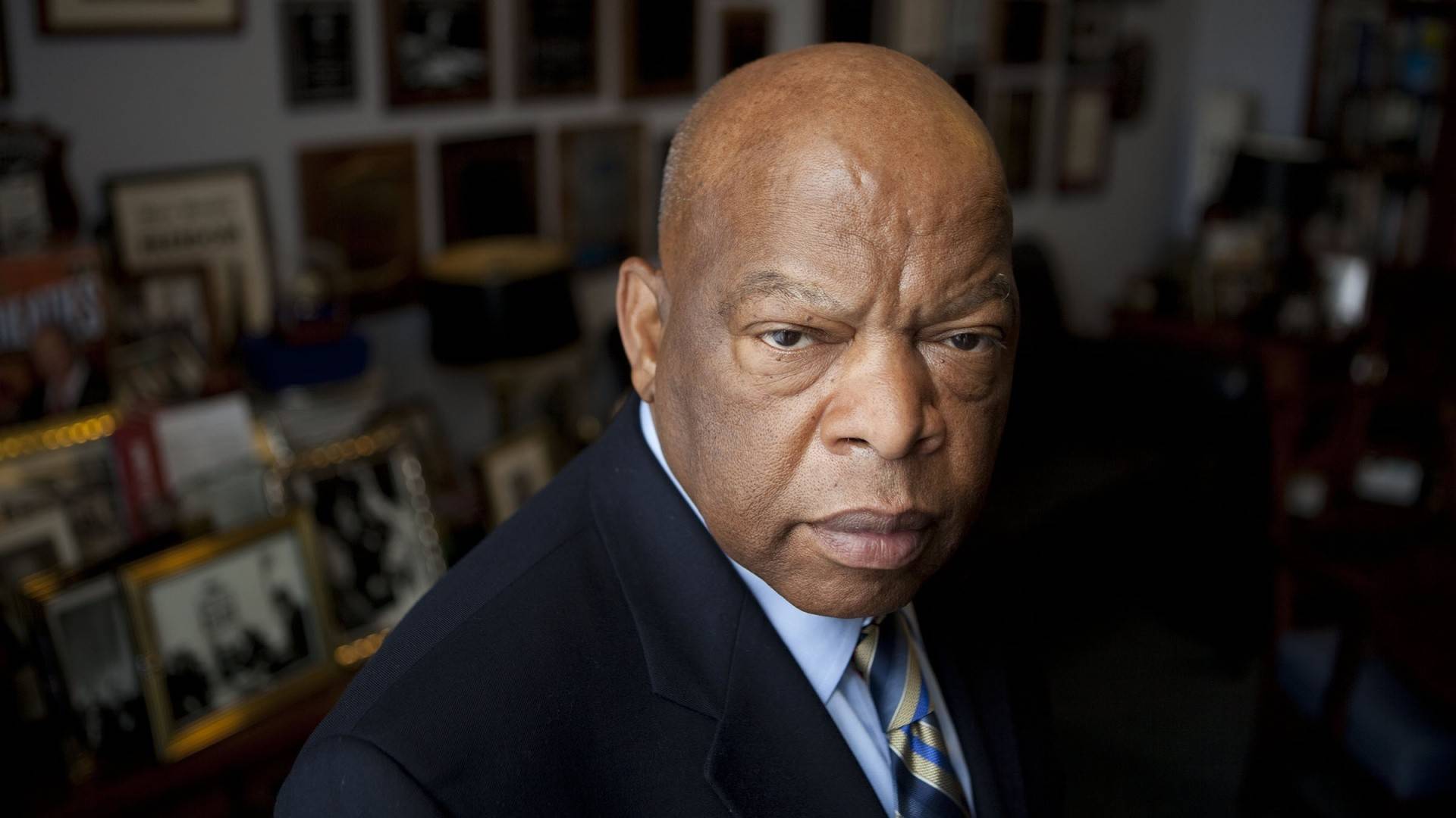 John Lewis picture - 3/4 face in a home office.