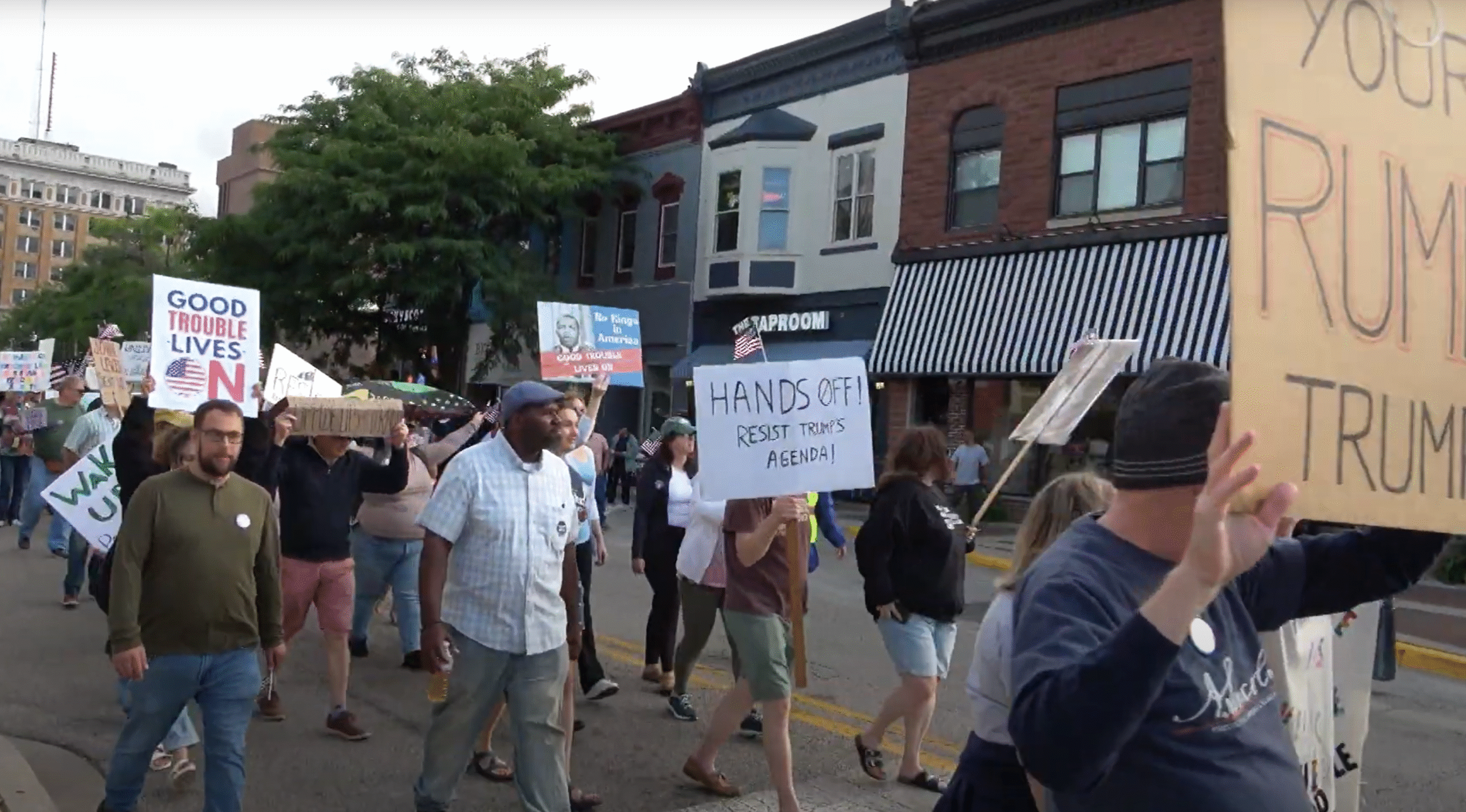 Street Photo of people marching in Good Trouble Rally in Downtown Waukegan 2025